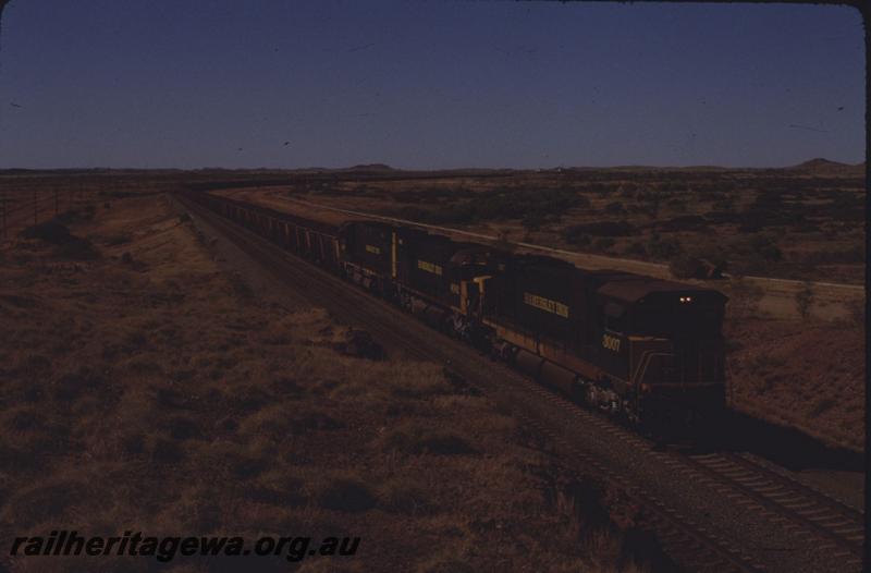 T01644
Hamersley Iron locos, C636 class 3007 leading, on iron ore train 
