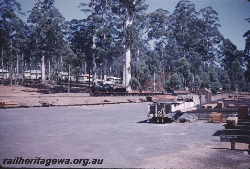 T01700
Mill yard, Donnelly River, YX 86 in background
