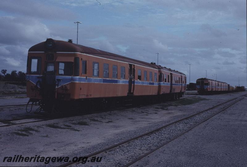 T01779
ADA class 765 on railcar set, orange livery
