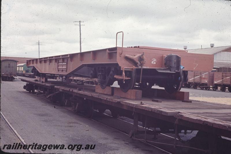 T01841
Newly constructed standard gauge WF class flat wagons,(later reclassified to WFDY), on narrow gauge flat wagons, Midland Workshops
