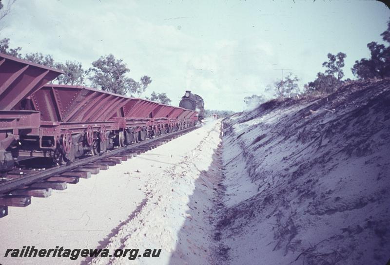 T01855
LA class ballast hoppers, construction of the Kwinana to Jarrahdale line, on the site of the Peel Estate
