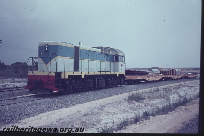 T02411
J class loco, WF class flat wagon, (later reclassified to WFDY),work train
