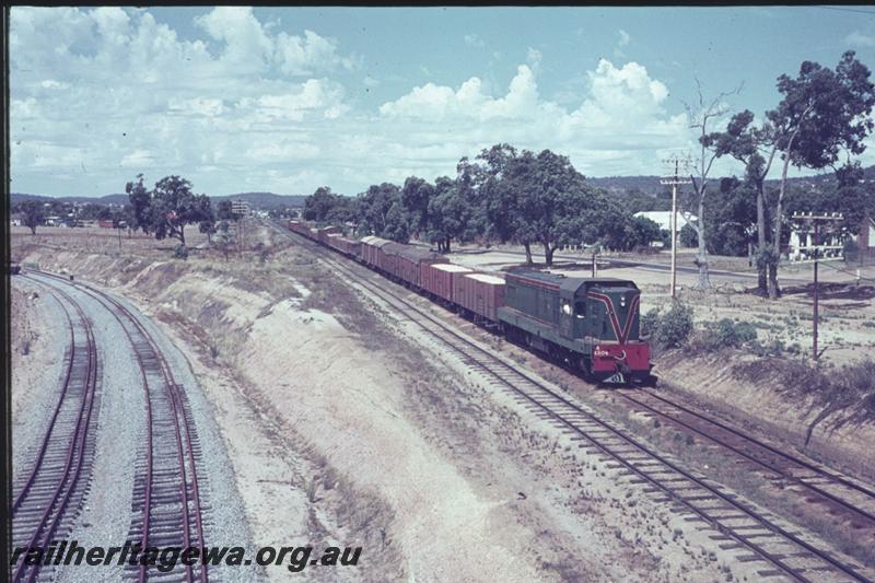 T02434
A class 1504, on the old Eastern line approaching Bellevue, ER line. New Standard Gauge Line under construction
