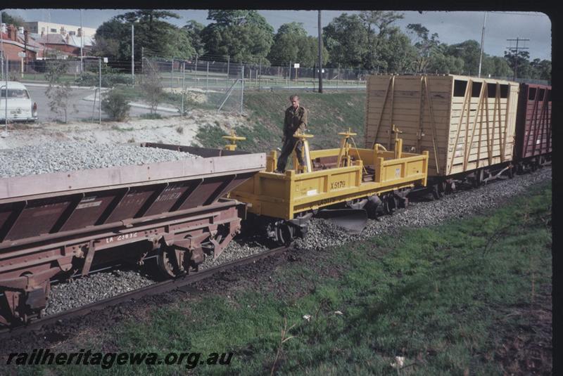 T02487
LA class 23832 ballast hopper, LX class 5179 ballast plough in yellow livery, ballasting operations
