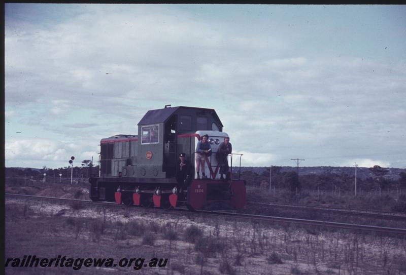 T02575
B class 1604, near Forrestfield, staff riding on front of loco
