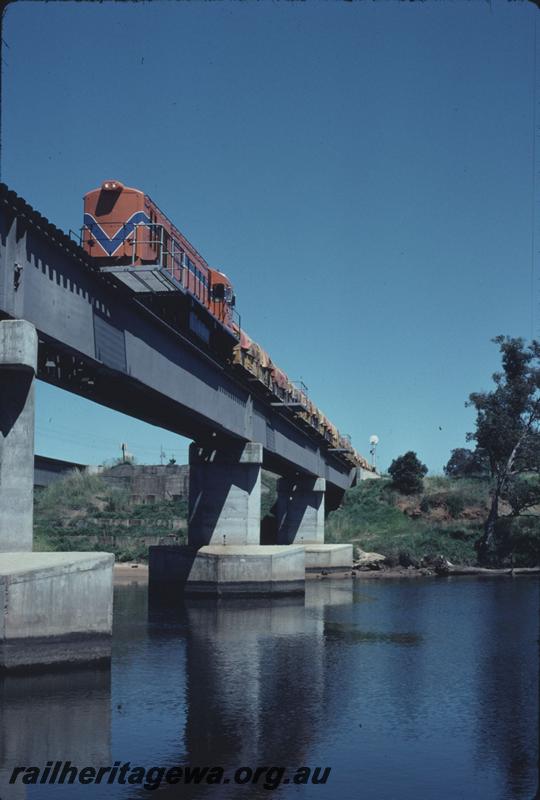 T02651
RA class 1909, steel girder bridge on concrete pylons, Guildford, goods train
