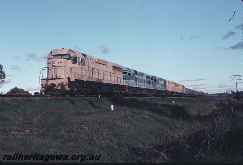 T02702
L class 266, pink livery, leading 4 more L classes, the trailing pair of L class locos also in the 