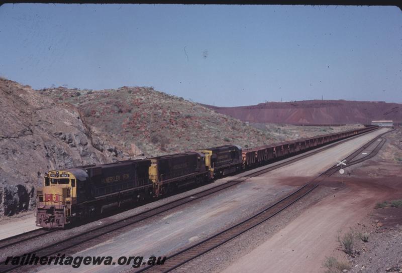 T02904
Hamersley Iron Alco locomotives M636 class 4043, C628 class 2001 and M636 class 4053 on loaded iron ore train.
