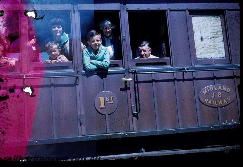 T02914
MRWA J class 8 carriage, first class compartment with passengers looking out.
