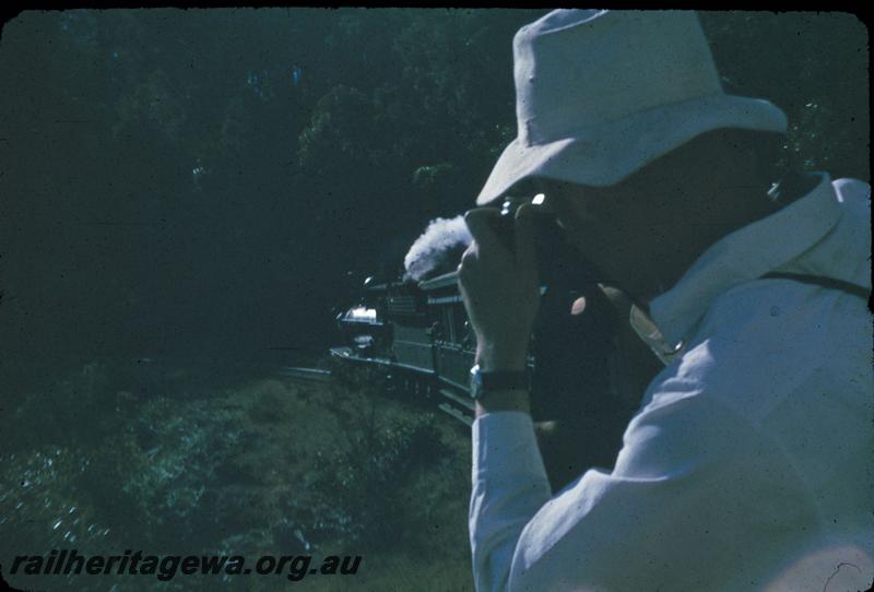 T02984
Millars loco No.58 being photographed by a passenger on train
