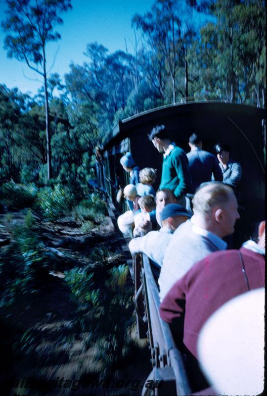 T02997
Passengers in open wagons on Millars train
