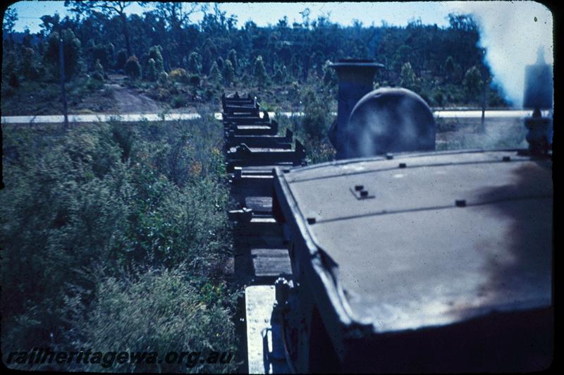 T03006
Millars loco No.58, view back along train of empty wagons
