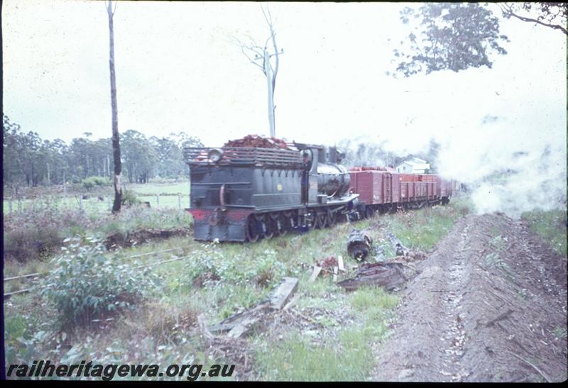 T03101
SSM loco No.2, Deanmill, hauling a train of loaded WAGR wagons, tender first
