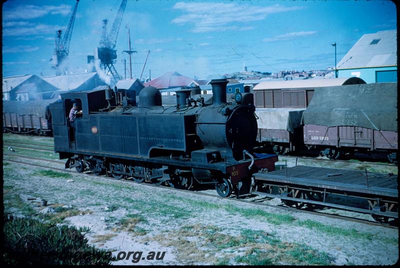 T03160
K class 103, NS class shunters float, tarpaulin covered GER class 13175,goods yard, North Fremantle, shunting
