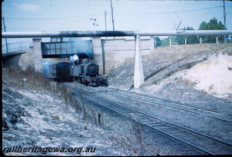 T03188
DS class 372, emerging from under the Thomas Street bridge, suburban passenger train.
