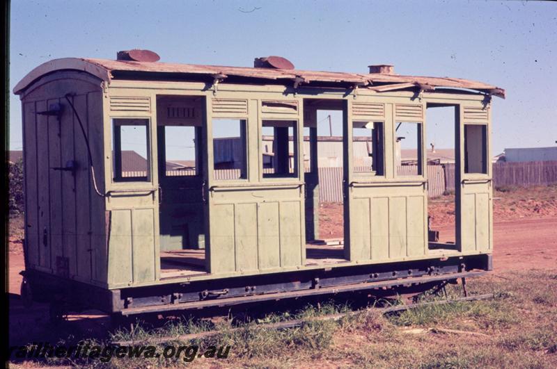 T03235
Ex WAGR AI class 4 wheeled carriage, dilapidated state, end and side view, Carnarvon
