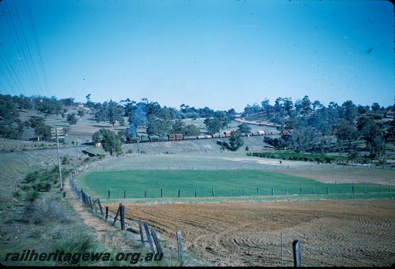 T03243
PM class double heading with a W class approaching Swan View, ER line, goods train 
