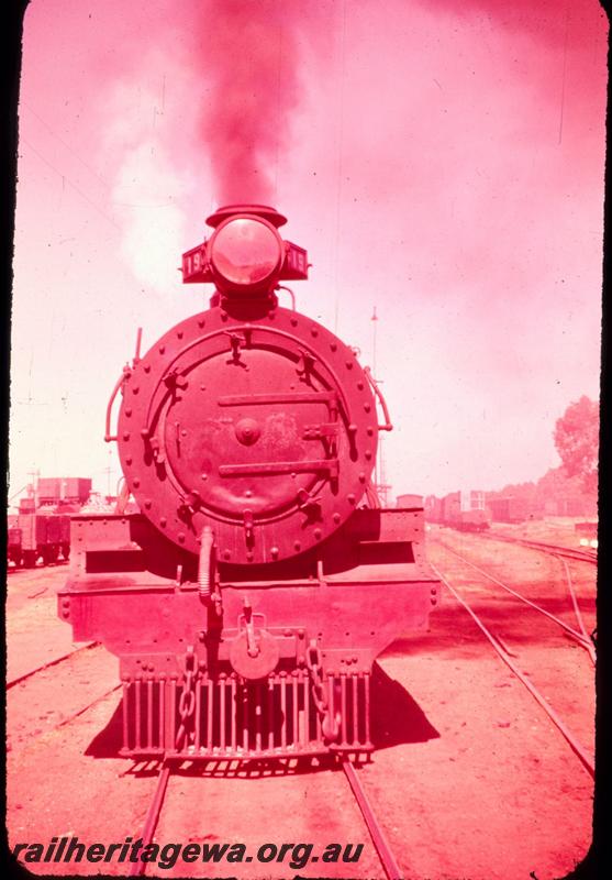 T03296
MRWA D class 19, Unknown location. Head on view. (Photo has turned red)
