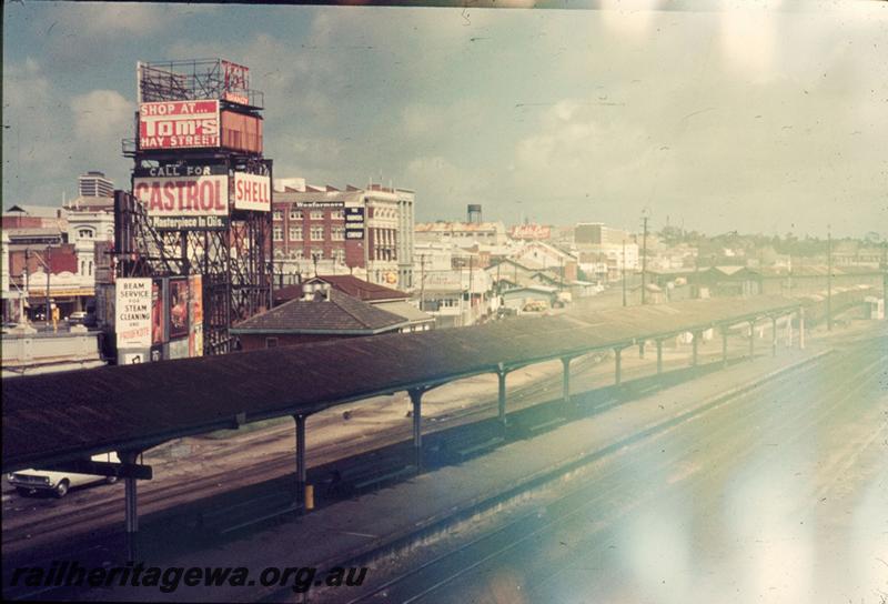 T03349
Water tower, Perth Station, covered in advertisements, photo taken from the 