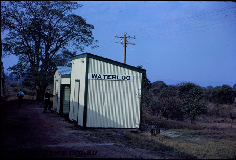 T03492
Out Of Shed, round top Staff cabin, nameboard, Waterloo, SWR line, trackside side view
