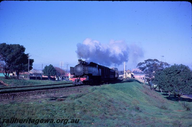 T03509
DM class 584, signal box, Mount Lawley, hauling a MRWA passenger train

