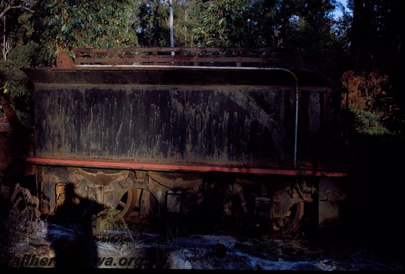 T03620
Bunnings loco tender, Manjimup, side on view of 6 wheel tender
