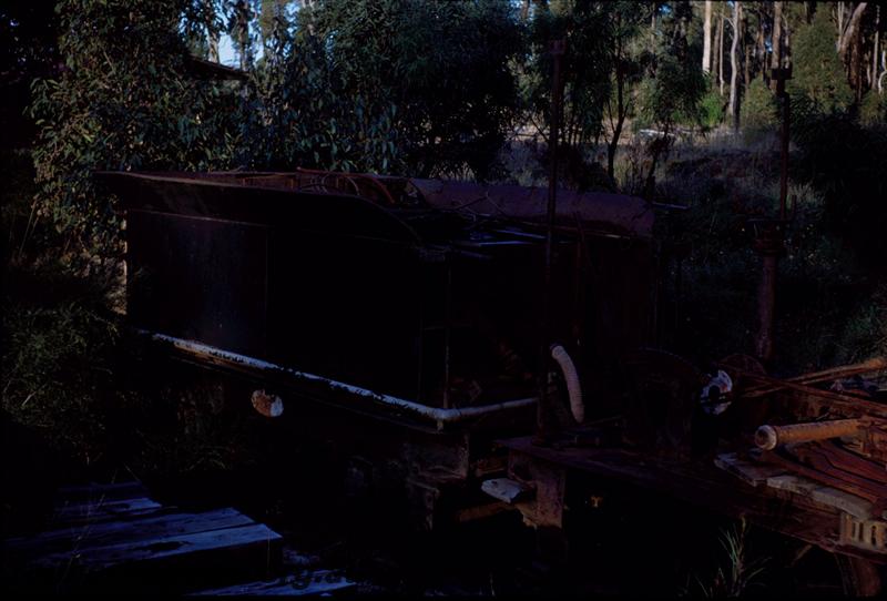 T03621
Bunnings loco tender, Manjimup, side and front of view of 6 wheel tender
