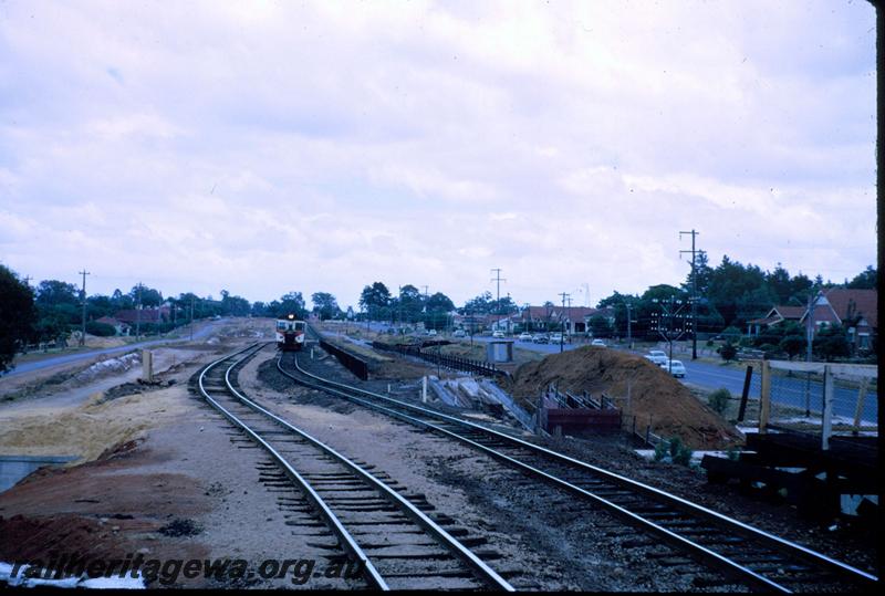 T03787
Deviation, West Midland, railcar set in background
