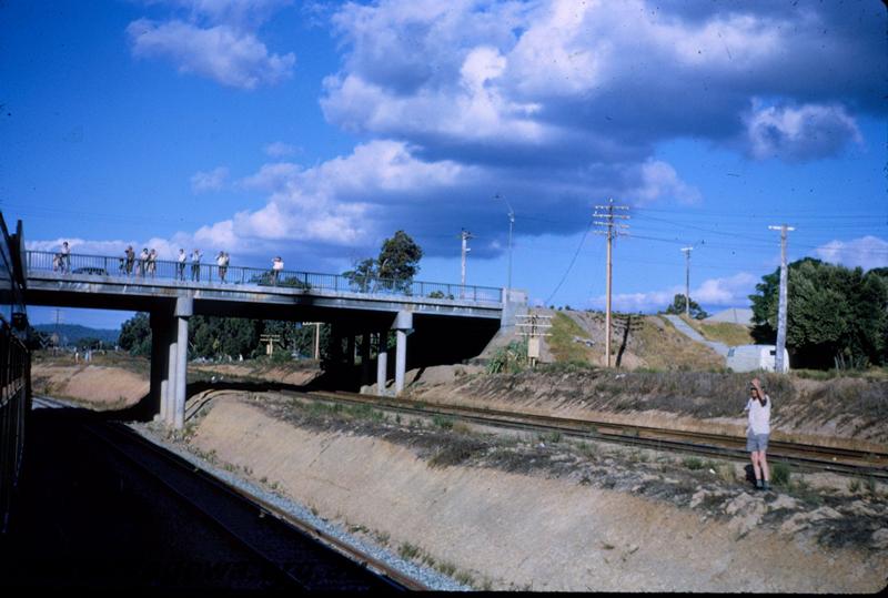 T03792
Road over bridge, Bellevue, narrow gauge tracks still in position, last day of the narrow gauge line.
