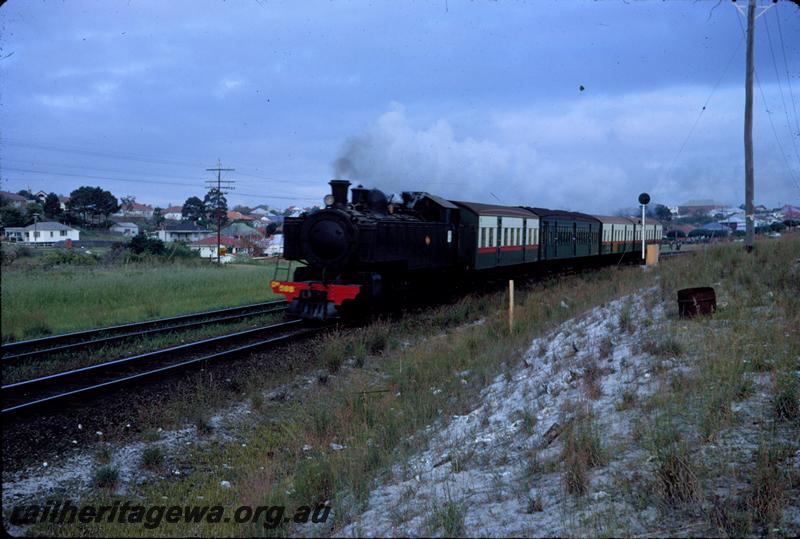 T03802
DM class 588, Bayswater, suburban passenger train, an AY class carriage still in the overall green livery
