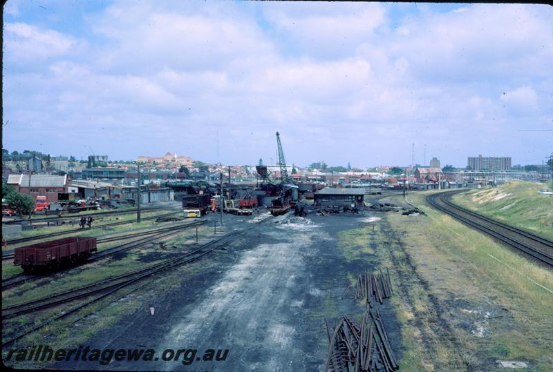 T03825
Loco depot, East Perth looking towards the coal stage once stood. The temporary loco depot in background showing the coal stage
