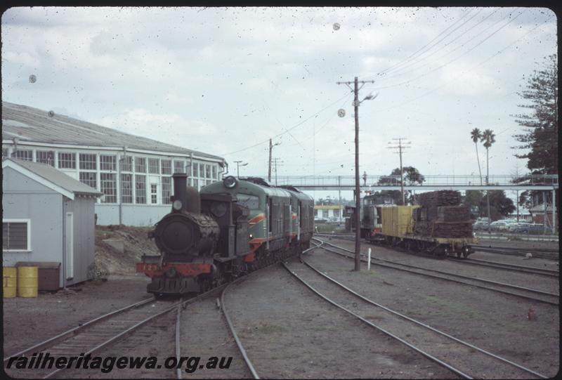T03903
G class 123, roundhouse, Bunbury, being moved by a pair of X class locos
