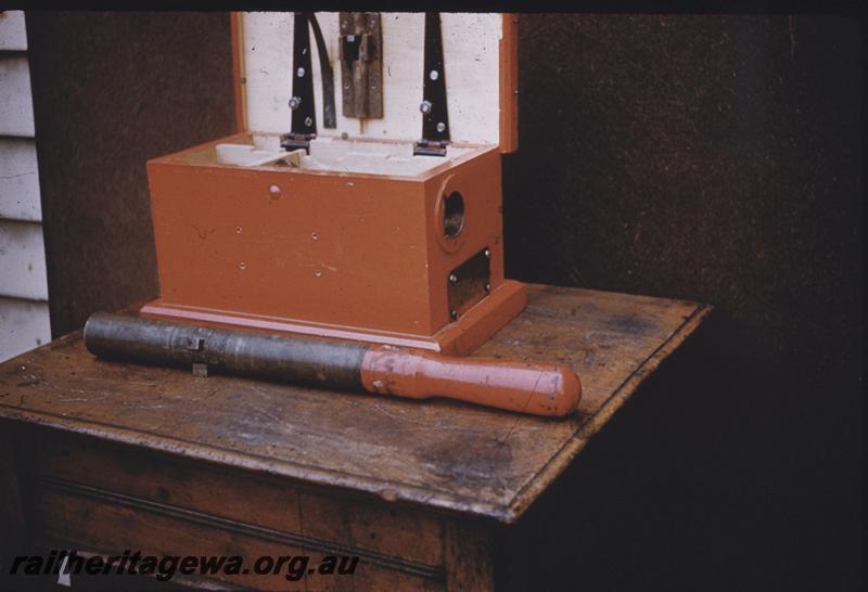 T03908
Staff and box, on display
