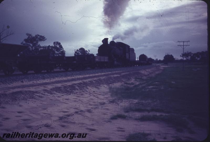 T03946
FS class, on the site of the Peel Estate Railway, on ballast train on the new Kwinana to Jarrahdale line 
