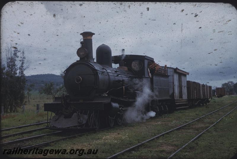 T03988
Millars loco No.71, on train with van in consist, front and side view
