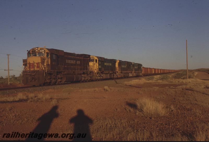 T04035
Hamersley Iron M636 class 4030 and M636 class 4055 lead two rebuilt CE636R class units, loaded train near Dingo, RIO line
