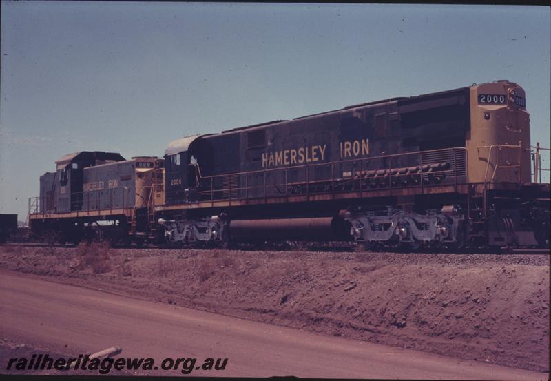 T04042
Hamersley Iron Alco locos C628 class 2000 and C415 class 008, later renumbered to 1000, on transfer bogies, Seven Mile Workshops
