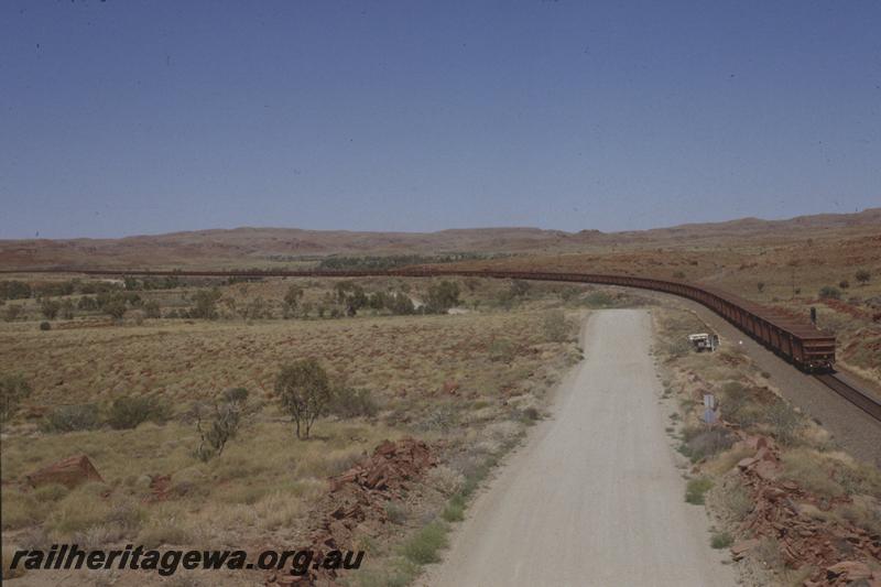 T04052
Hamersley Iron empty ore train, heading towards Emu, taken from Robe River fly-over, Western Creek, RIO line
