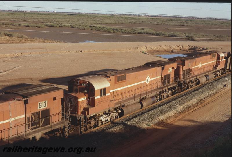 T04082
Mount Newman Mining Alco locos M636 class 5475, M636 class 5480, empty train departing Nelson Point at Redbank Bank Bridge, BHP line
