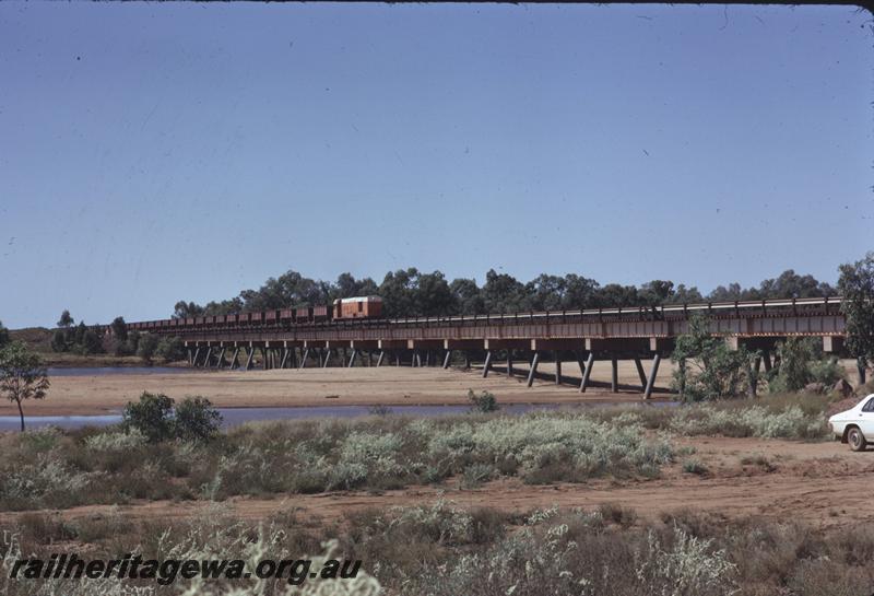 T04097
Goldsworthy Mining Limited English Electric loco A class 3, similar to WAGR K class, loaded train, De Grey River bridge, BHP line
