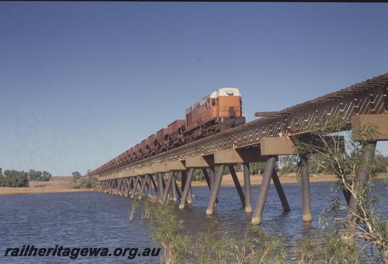 T04099
Goldsworthy Mining Limited English Electric loco A class 3, similar to WAGR K class, empty train, De Grey River bridge, BHP line
