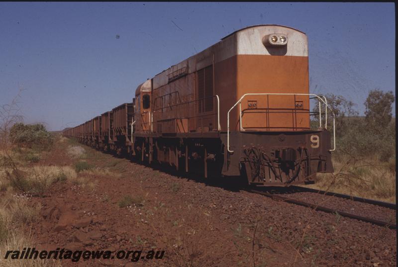 T04108
Goldsworthy Mining Limited English Electric loco A class 9, similar to WAGR K class, loaded train, departing Goldsworthy, BHP line
