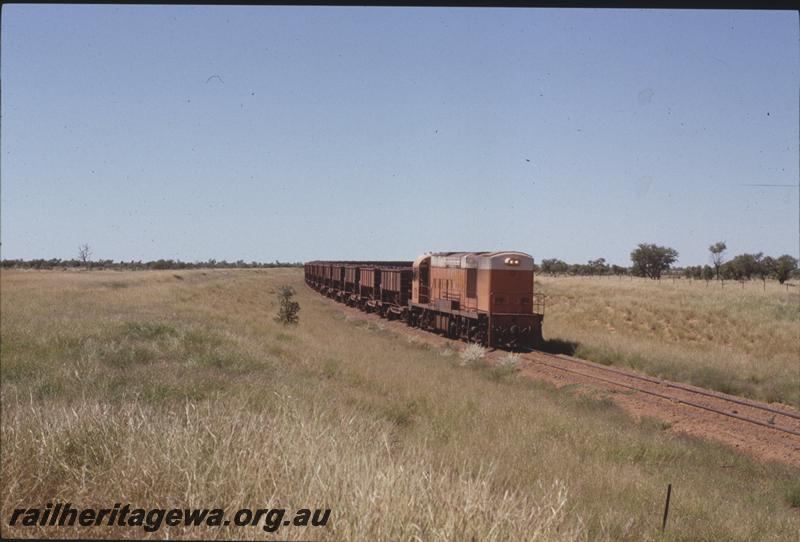 T04114
Goldsworthy Mining Limited English Electric loco A class 8, loaded train, Strelley River area, BHP line
