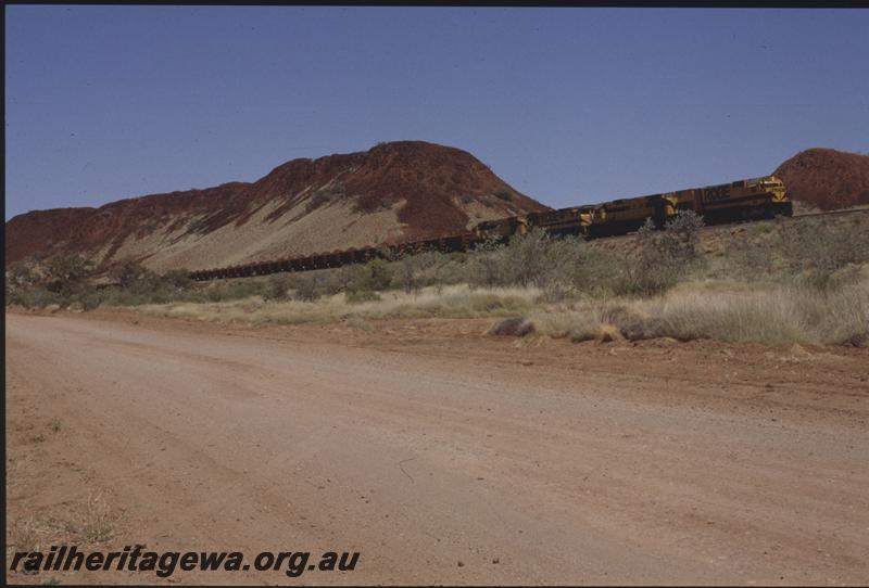 T04123
Robe River Iron Associates Alcos and GE, loaded ore train, Western Creek - Siding Two area, Rio line
