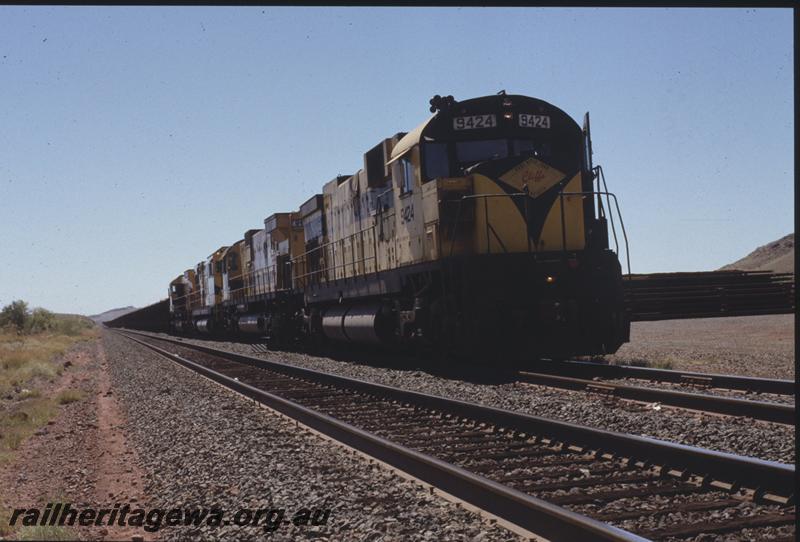 T04127
Robe River Iron Associates C636 class 9424, loaded train, quad heading, Siding One, RIO line
