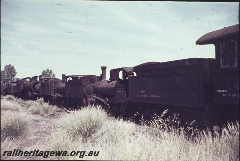 T04213
Row of written off locos, Midland Workshops graveyard, view along the line of locos
