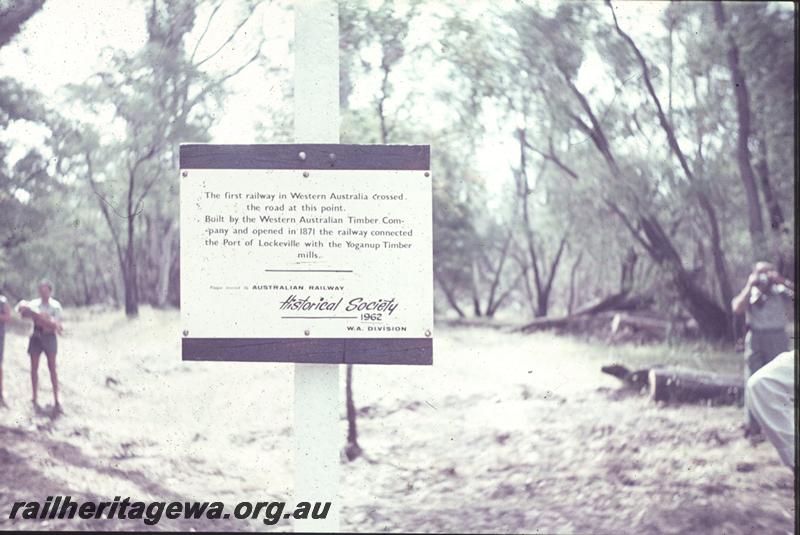 T04214
Sign erected by the WA Division of the ARHS noting the spot where the first railway in WA crossed the road at Wonnerup.
