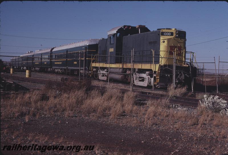 T04240
Former Hamersley Iron C415 class 1000 loco and repainted NSW passenger carriages, Dampier, Pilbara Railway Historical Society compound, 
