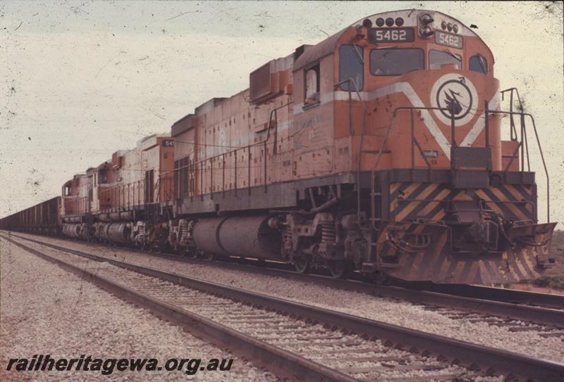 T04241
 Mount Newman Mining Alco C636 class 5462 and two sisters with a loaded train, Port Hedland - Newman railway, BHP line,
