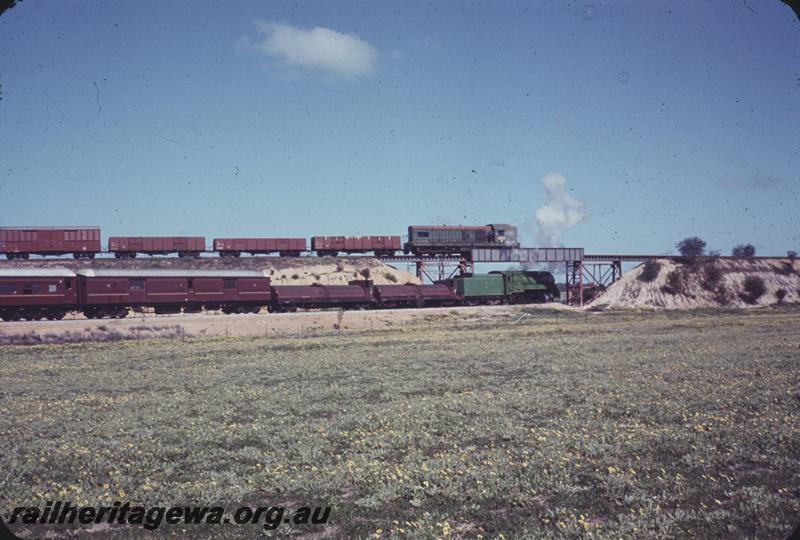 T04316
A class 1505 on goods train on flyover at Meenaar, EGR line while NSWGR loco C3801 passed underneath on the 